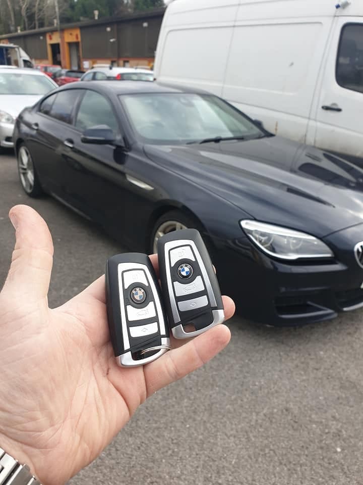 Two BMW smart keys programmed for a black BMW 6 Series Gran Coupe